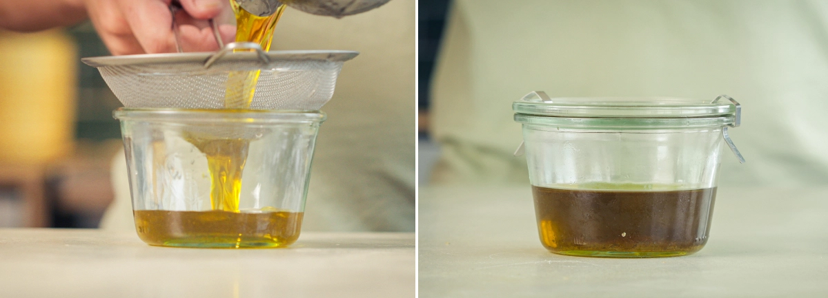 Aceite de oliva infusionado con cannabis filtrándose a través de un colador fino en un recipiente de cristal.