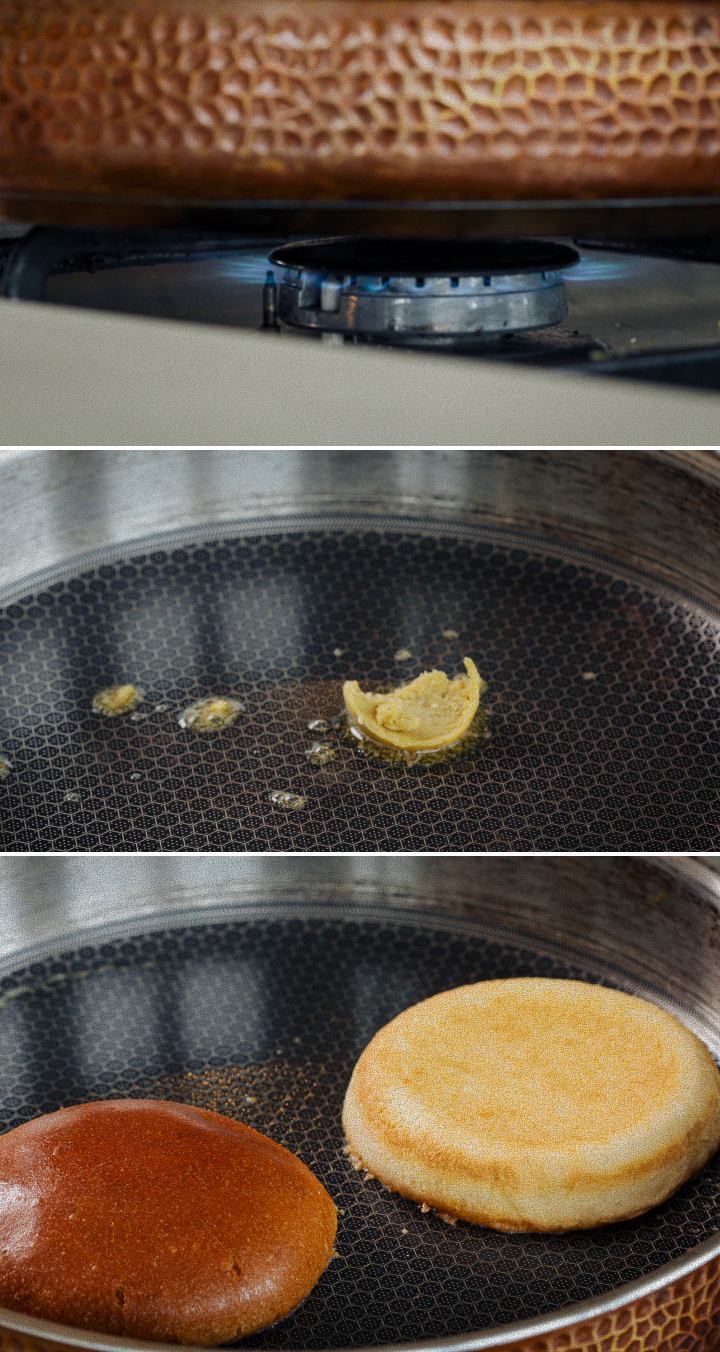 Infusionando los panes de hamburguesa tostándolos en mantequilla de cannabis en una sartén, segundo paso para preparar una hamburguesa con cannabis