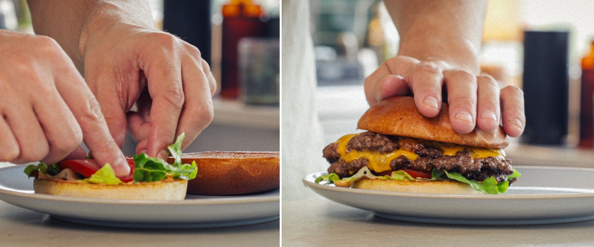 Assemblage et service d’un burger au cannabis terminé avec cheddar fondu, laitue, tomate et pain infusé